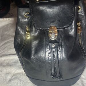 Marino Orlandi Black Leather Drawstring Backpack with Gold Accents